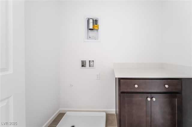 2501 Indigo Mountain St, Henderson, NV 89044 - laundry room featuring washer hookup, cabinet space, and baseboards