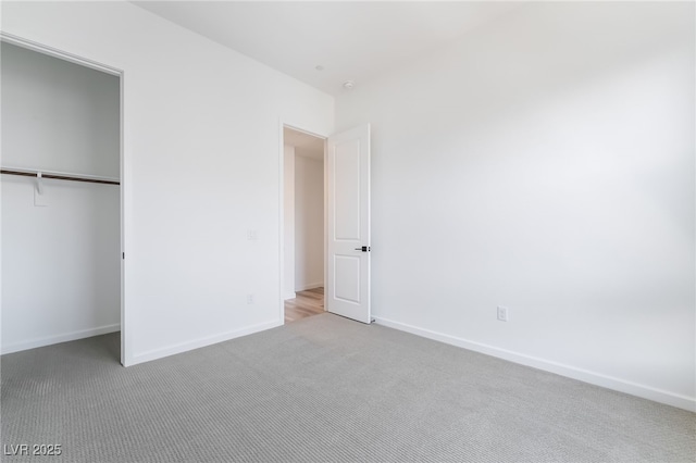 2501 Indigo Mountain St, Henderson, NV 89044 - unfurnished bedroom featuring carpet flooring, baseboards, and a closet
