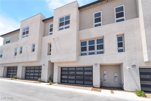 2501 Indigo Mountain St, Henderson, NV 89044 - multi unit property featuring stucco siding and an attached garage