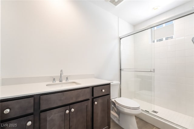 2501 Indigo Mountain St, Henderson, NV 89044 - full bathroom featuring toilet, a stall shower, vanity, and tile patterned flooring