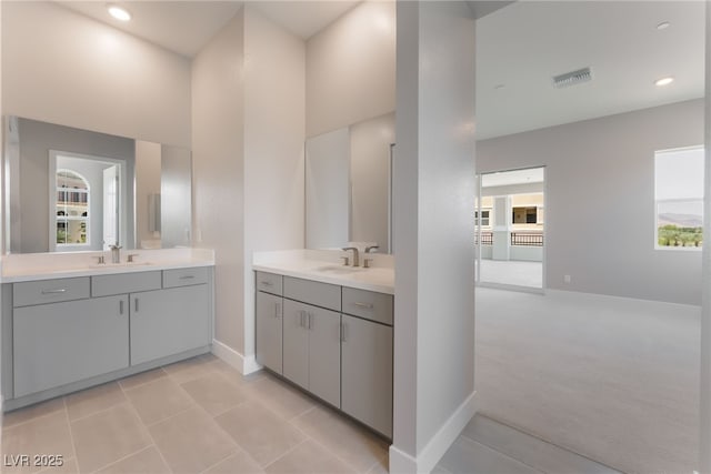 128 Los Cabos Dr Unit 301, Las Vegas, NV 89144 - full bath with two vanities, baseboards, and recessed lighting