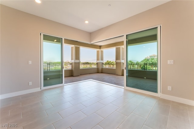 128 Los Cabos Dr Unit 301, Las Vegas, NV 89144 - spare room featuring baseboards, recessed lighting, and tile patterned flooring