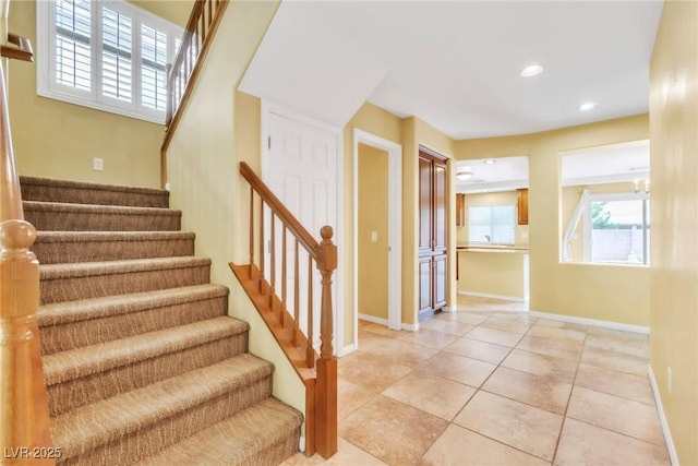 6558 Musette Ave, Las Vegas, NV 89139 - stairway with recessed lighting, tile patterned floors, and baseboards