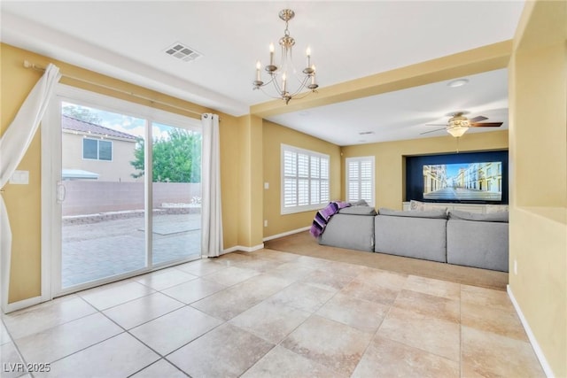 6558 Musette Ave, Las Vegas, NV 89139 - unfurnished living room featuring baseboards, a chandelier, and a ceiling fan