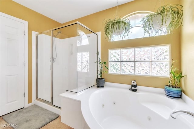 6558 Musette Ave, Las Vegas, NV 89139 - full bath featuring a stall shower, a jetted tub, and healthy amount of natural light