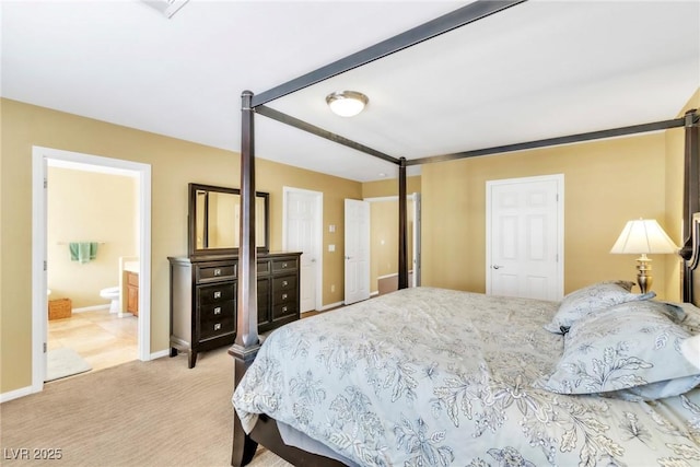 6558 Musette Ave, Las Vegas, NV 89139 - carpeted bedroom with baseboards and ensuite bath