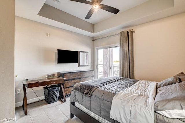 83 E Agate Ave Unit 207, Las Vegas, NV 89123 - bedroom featuring a tray ceiling, access to exterior, and a ceiling fan