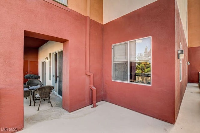 83 E Agate Ave Unit 207, Las Vegas, NV 89123 - entrance to property featuring a patio and stucco siding