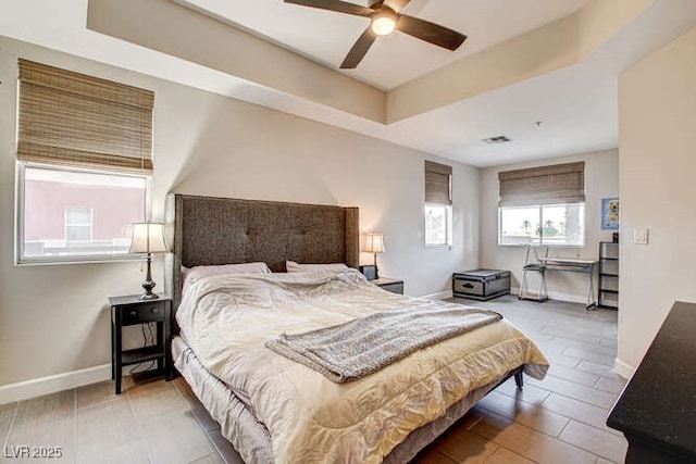 83 E Agate Ave Unit 207, Las Vegas, NV 89123 - bedroom featuring a tray ceiling and ceiling fan