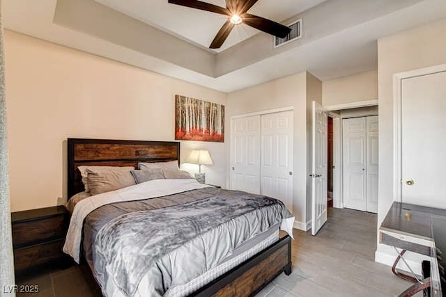 83 E Agate Ave Unit 207, Las Vegas, NV 89123 - bedroom featuring a tray ceiling and ceiling fan