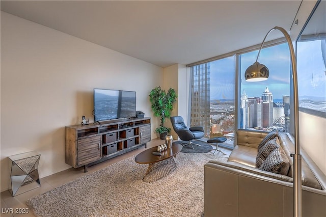 3726 Las Vegas Blvd Unit 3105, Las Vegas, NV 89158 - living room featuring plenty of natural light, a wall of windows, and tile patterned floors