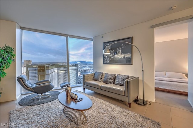 3726 Las Vegas Blvd Unit 3105, Las Vegas, NV 89158 - living area featuring tile patterned floors and a wall of windows