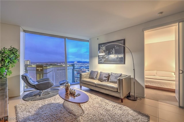 3726 Las Vegas Blvd Unit 3105, Las Vegas, NV 89158 - living area with a wall of windows and tile patterned floors