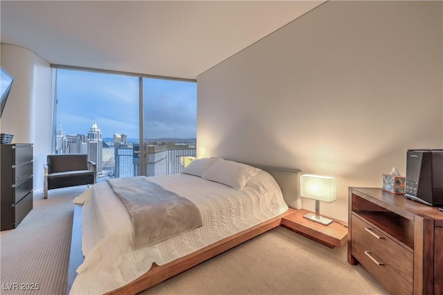 3726 Las Vegas Blvd Unit 3105, Las Vegas, NV 89158 - bedroom with light carpet and a city view