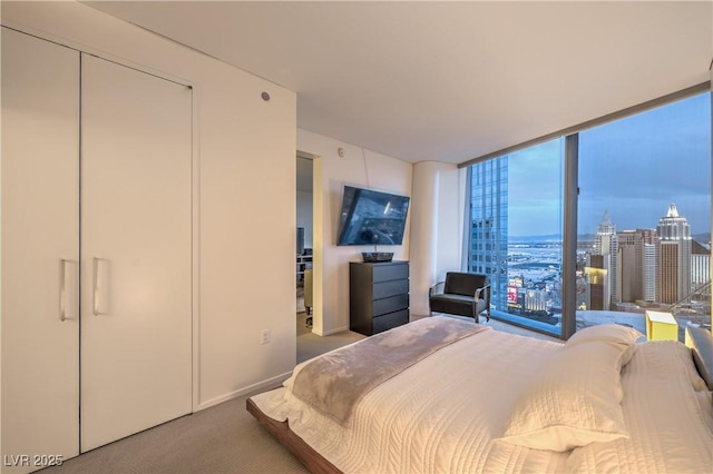 3726 Las Vegas Blvd Unit 3105, Las Vegas, NV 89158 - bedroom with carpet flooring and a wall of windows