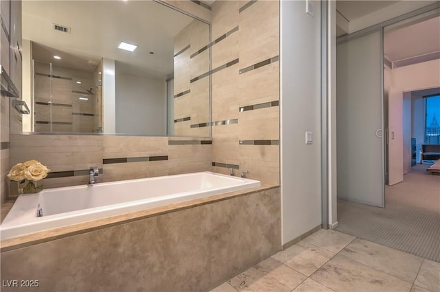 3726 Las Vegas Blvd Unit 3105, Las Vegas, NV 89158 - bathroom with a garden tub and a shower