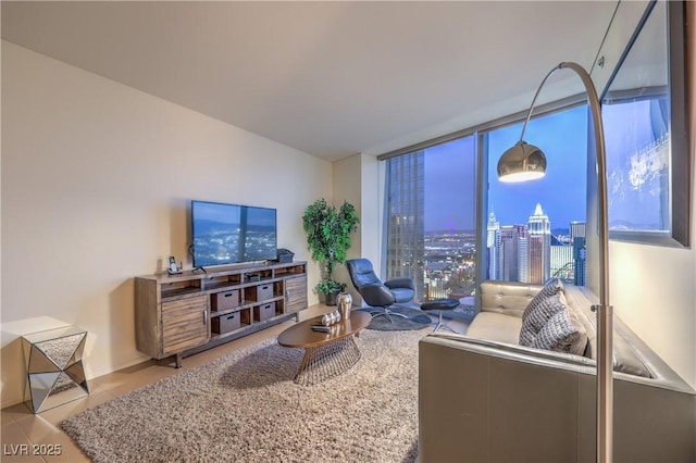 3726 Las Vegas Blvd Unit 3105, Las Vegas, NV 89158 - tiled living room featuring floor to ceiling windows and baseboards