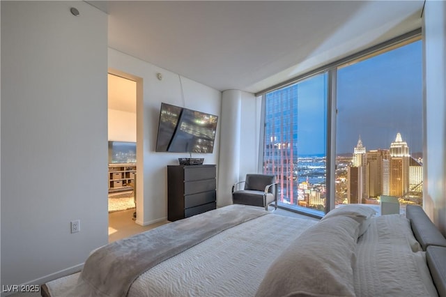 3726 Las Vegas Blvd Unit 3105, Las Vegas, NV 89158 - carpeted bedroom with floor to ceiling windows and baseboards