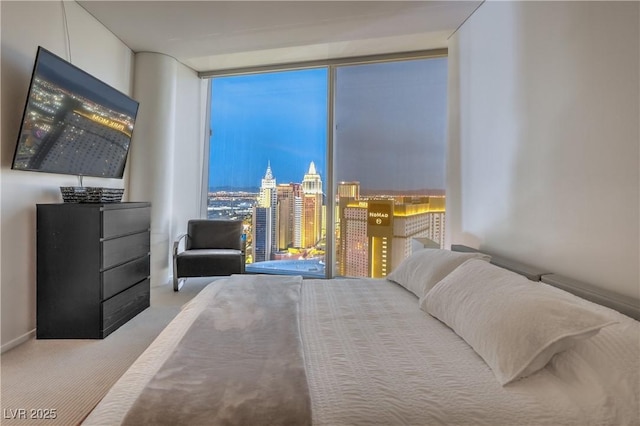 3726 Las Vegas Blvd Unit 3105, Las Vegas, NV 89158 - bedroom with expansive windows, carpet floors, and a view of city