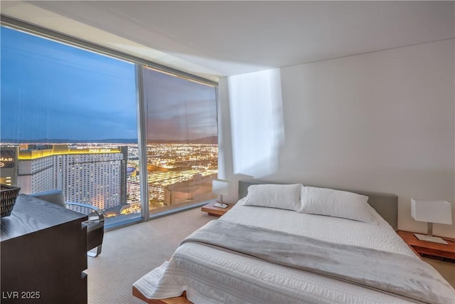 3726 Las Vegas Blvd Unit 3105, Las Vegas, NV 89158 - bedroom featuring a wall of windows, carpet floors, and a view of city