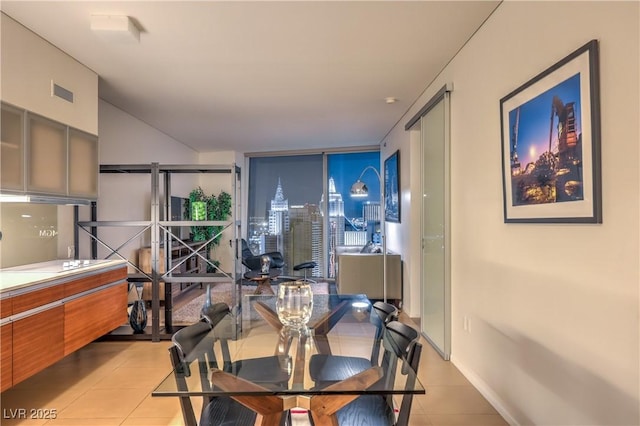 3726 Las Vegas Blvd Unit 3105, Las Vegas, NV 89158 - dining area with light tile patterned floors and expansive windows