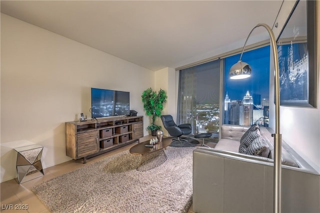 3726 Las Vegas Blvd Unit 3105, Las Vegas, NV 89158 - living room featuring a wall of windows and tile patterned floors