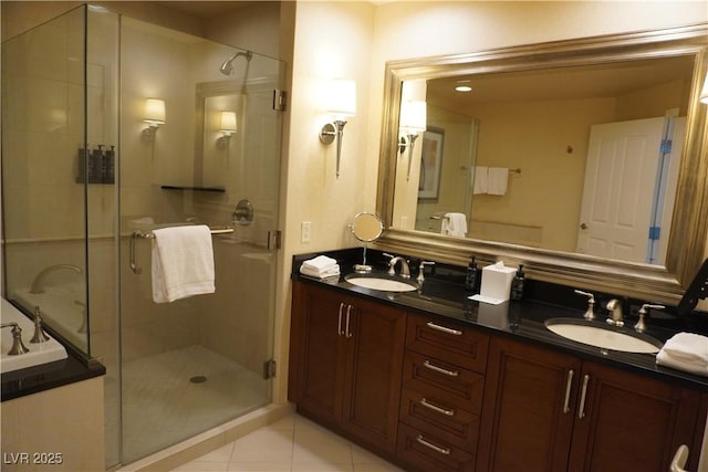 145 E Harmon Ave Unit 27619, Las Vegas, NV 89109 - full bath featuring double vanity, a stall shower, and tile patterned flooring