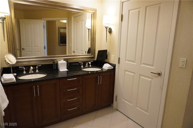 145 E Harmon Ave Unit 27619, Las Vegas, NV 89109 - bathroom with double vanity and tile patterned floors