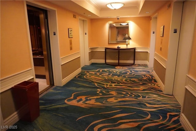 145 E Harmon Ave Unit 27619, Las Vegas, NV 89109 - hallway with carpet floors, crown molding, and a raised ceiling