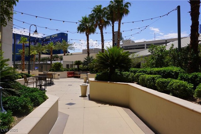 145 E Harmon Ave Unit 27619, Las Vegas, NV 89109 - view of home's community featuring a patio area