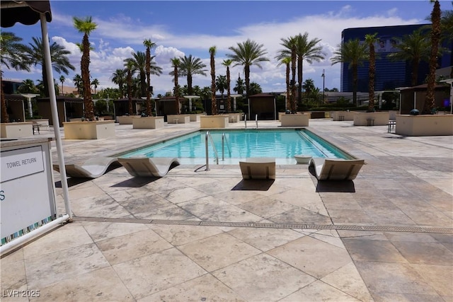 145 E Harmon Ave Unit 27619, Las Vegas, NV 89109 - community pool with a patio area and area for grilling