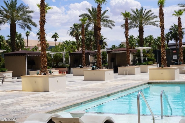 145 E Harmon Ave Unit 27619, Las Vegas, NV 89109 - community pool with a patio, a gazebo, and exterior kitchen