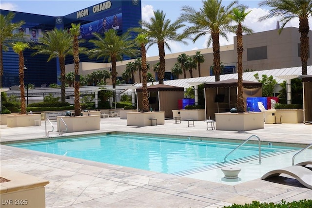 145 E Harmon Ave Unit 27619, Las Vegas, NV 89109 - community pool featuring a patio area