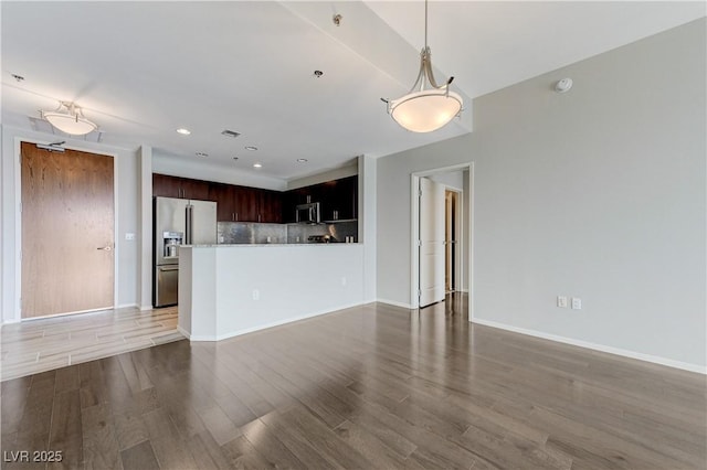 8255 S Las Vegas Blvd Unit 1816, Las Vegas, NV 89123 - unfurnished living room featuring light wood-style flooring, baseboards, and recessed lighting