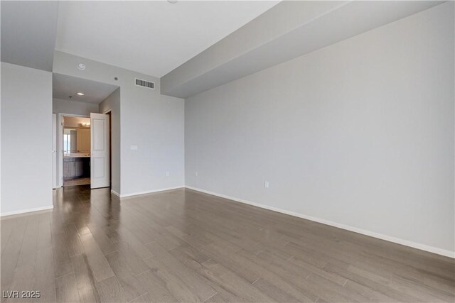 8255 S Las Vegas Blvd Unit 1816, Las Vegas, NV 89123 - unfurnished living room featuring wood finished floors and baseboards