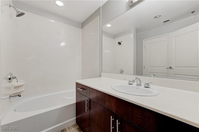 8255 S Las Vegas Blvd Unit 1816, Las Vegas, NV 89123 - bathroom featuring vanity, recessed lighting, and tub / shower combination