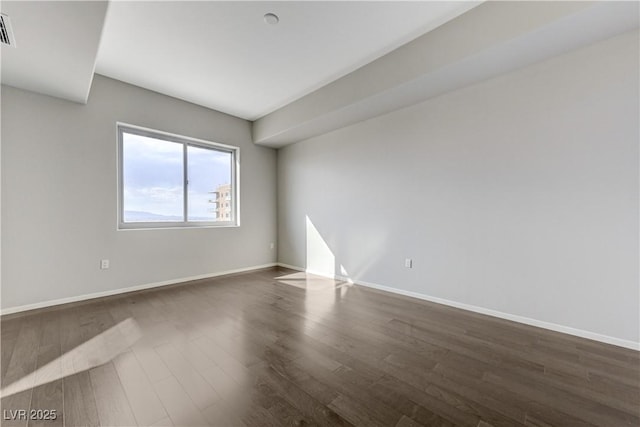 8255 S Las Vegas Blvd Unit 1816, Las Vegas, NV 89123 - unfurnished room featuring dark wood-style floors and baseboards