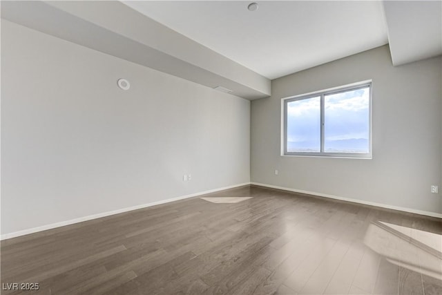 8255 S Las Vegas Blvd Unit 1816, Las Vegas, NV 89123 - empty room featuring dark wood finished floors and baseboards