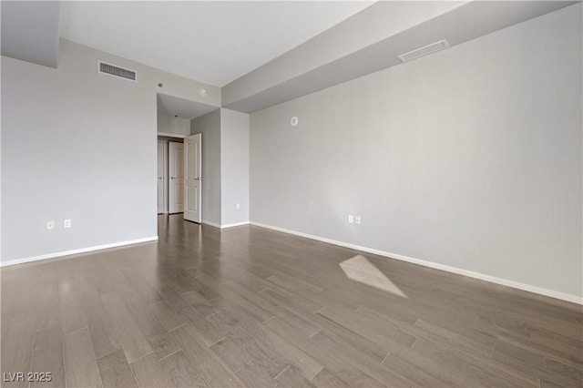 8255 S Las Vegas Blvd Unit 1816, Las Vegas, NV 89123 - empty room with dark wood-style floors and baseboards