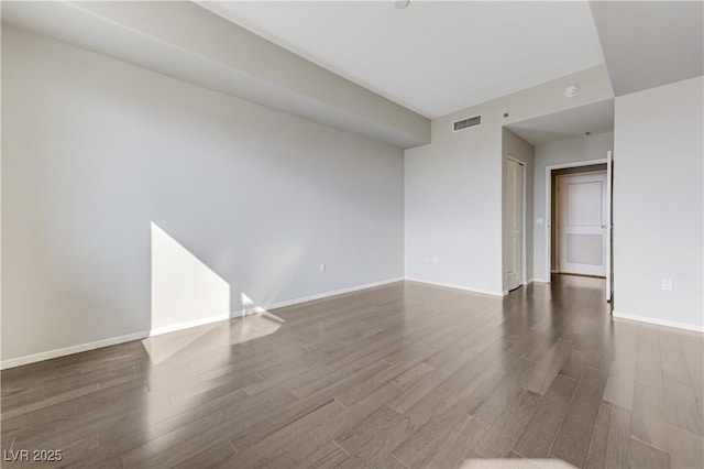 8255 S Las Vegas Blvd Unit 1816, Las Vegas, NV 89123 - empty room with dark wood-style floors and baseboards