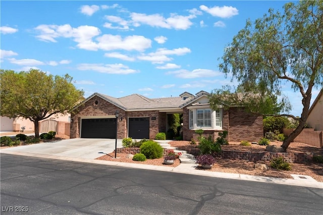8504 Mystic Night Ave, Las Vegas, NV 89143 - ranch-style house with an attached garage, driveway, brick siding, and a tile roof