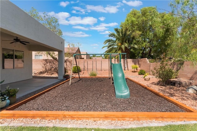 8504 Mystic Night Ave, Las Vegas, NV 89143 - view of playground with a ceiling fan, a fenced backyard, and a patio