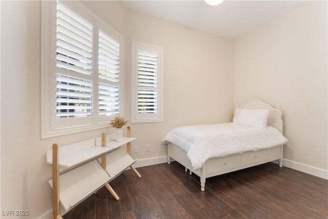 8504 Mystic Night Ave, Las Vegas, NV 89143 - bedroom featuring dark wood-type flooring and baseboards
