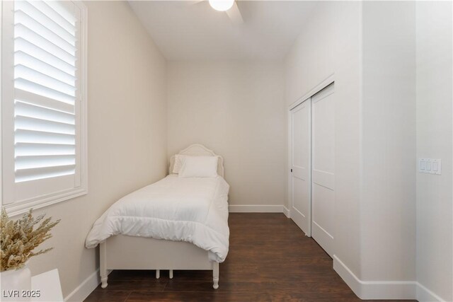 8504 Mystic Night Ave, Las Vegas, NV 89143 - bedroom with wood finished floors, a closet, baseboards, and ceiling fan