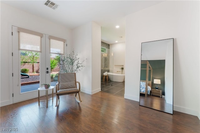 8504 Mystic Night Ave, Las Vegas, NV 89143 - living area with french doors, wood finished floors, and baseboards