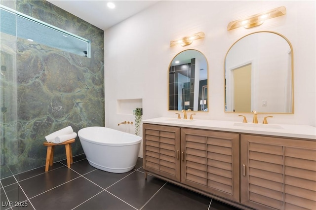 8504 Mystic Night Ave, Las Vegas, NV 89143 - bathroom featuring double vanity, a freestanding tub, tile patterned flooring, a shower, and recessed lighting