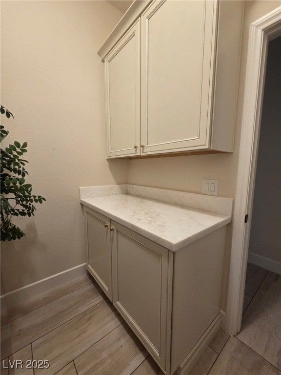 8504 Mystic Night Ave, Las Vegas, NV 89143 - detailed view of baseboards and wood finished floors