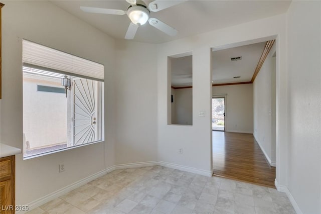 1793 Eagle Village Ave, Henderson, NV 89012 - empty room with ceiling fan, baseboards, and crown molding