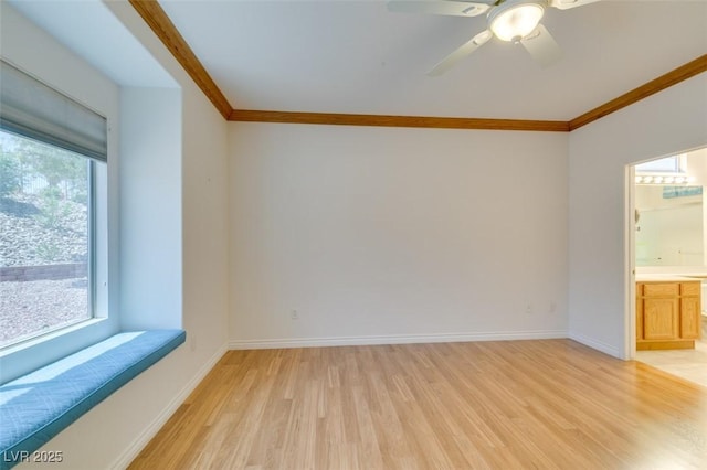 1793 Eagle Village Ave, Henderson, NV 89012 - empty room with light wood-type flooring, crown molding, ceiling fan, and baseboards