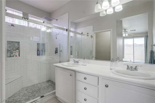 10605 Moon Flower Arbor Pl, Las Vegas, NV 89144 - full bathroom with a shower stall, double vanity, and ceiling fan